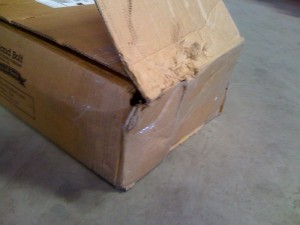 Example of a Portland Bolt box that was damaged in transit. Notice that the carrier tried to tape the boxes back together to conceal the damage.